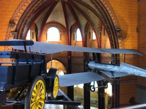 Cars on risers, airplanes suspended from ceilings: what a great use of churchy space! 