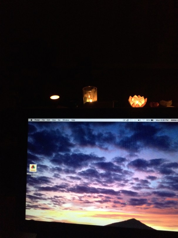 Computer, by candlelight. 