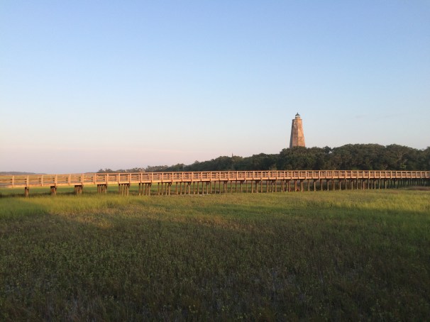 Old Baldy overlooks the changing landscape colors under a sunset sky.